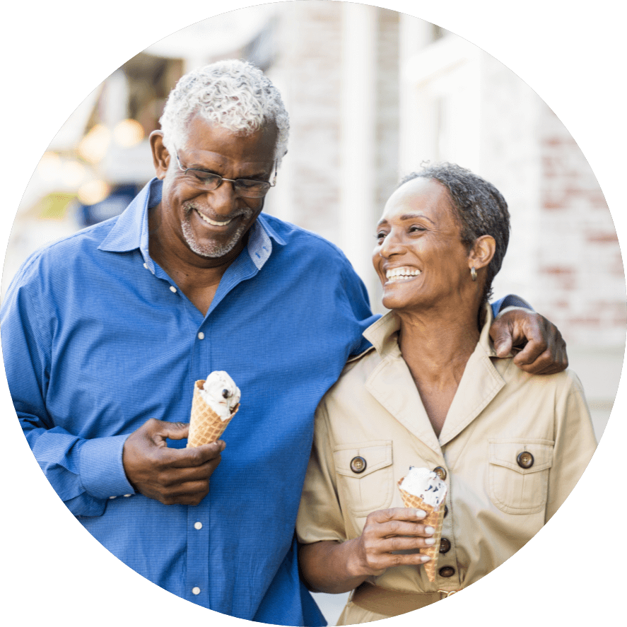 senior couple eating ice cream on a walk