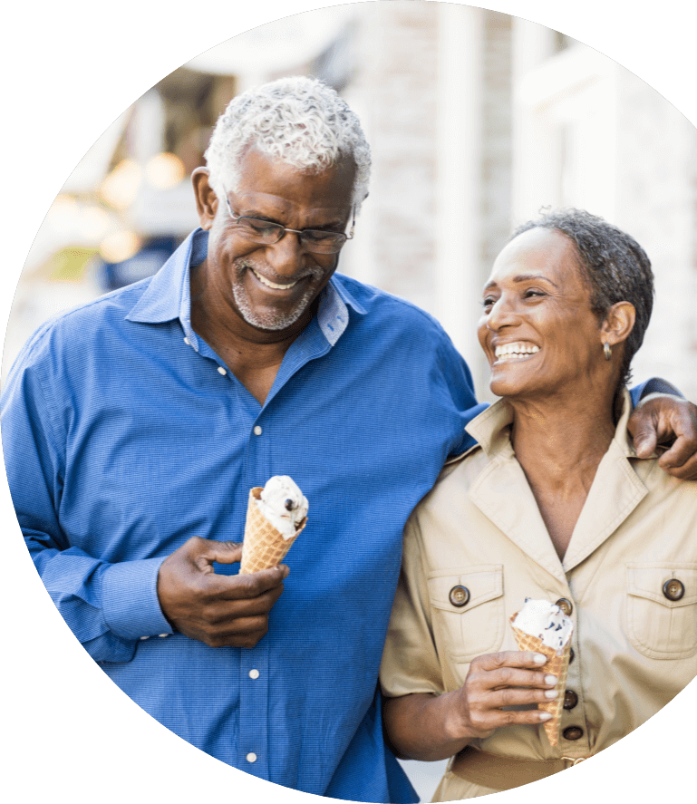 senior couple eating ice cream on a walk in New Orleans area